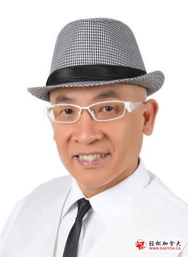 A person wearing a hat and glasses posing for the camera Description automatically generated