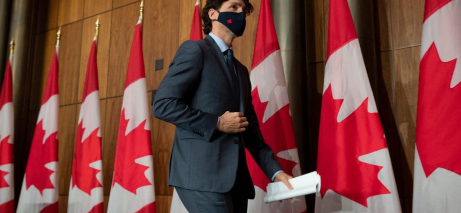 Prime Minister Justin Trudeau leaves a news conference in Ottawa on Wednesday, March 3, 2021. THE CANADIAN PRESS/Adrian Wyld.