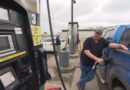 A man at a gas pump