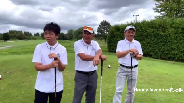 A group of men standing on a golf course Description automatically generated