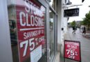 In this Sept. 2, 2020 photo, aassers-by walk past a business storefront with store closing and sale signs in Dedham, Mass.  The coronavirus and the drastic measures put in place by government officials to try to control its spread had a severe toll on many small businesses in the U.S.  (AP Photo/Steven Senne)