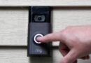 FILE - In this July 16, 2019, file photo, Ernie Field pushes the doorbell on his Ring doorbell camera at his home in Wolcott, Conn. Amazon says it has considered adding facial recognition technology to its Ring doorbell cameras. (AP Photo/Jessica Hill, File)