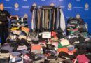 Metro Vancouver Transit Police display more than 800 clothing items from Lululemon that were seized from a home in Burnaby, B.C., (Handout)