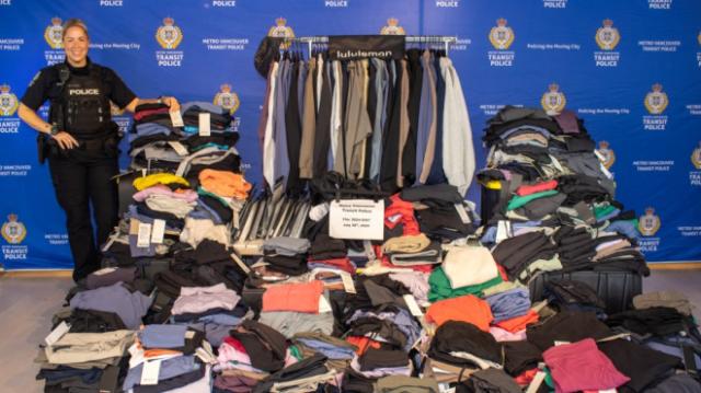 Metro Vancouver Transit Police display more than 800 clothing items from Lululemon that were seized from a home in Burnaby, B.C., (Handout)