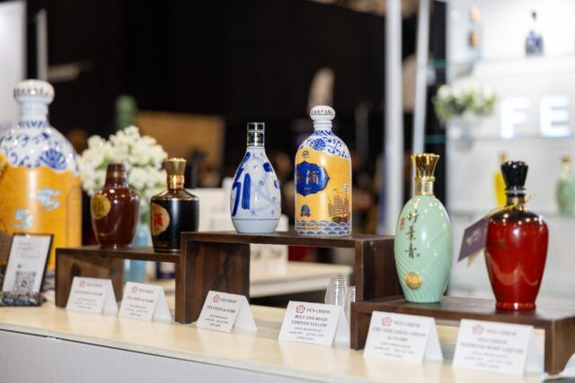A group of bottles on a shelf AI-generated content may be incorrect.