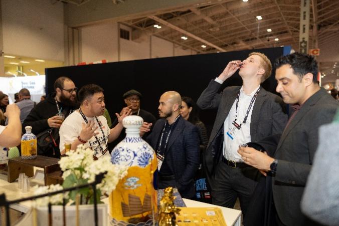 A group of people at a convention AI-generated content may be incorrect.