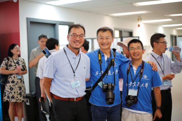 A group of men wearing lanyards and camera straps

AI-generated content may be incorrect.