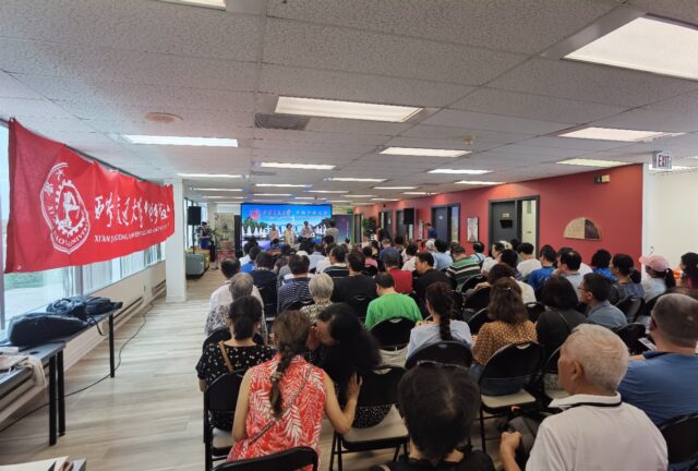 A group of people sitting in chairs in a room

AI-generated content may be incorrect.