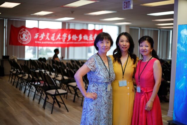 A group of women posing for a photo

AI-generated content may be incorrect.