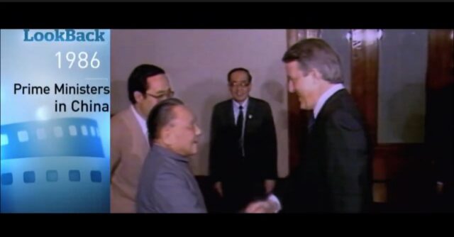 A group of men in suits AI-generated content may be incorrect.