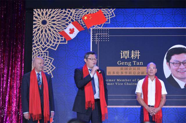 A group of men on a stage AI-generated content may be incorrect.