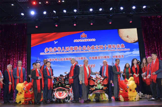 A group of people on a stage AI-generated content may be incorrect.