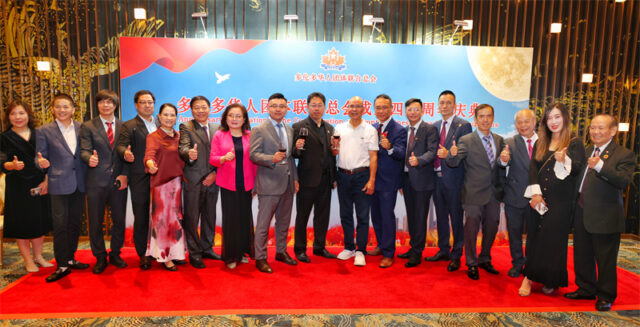 A group of people posing for a photo AI-generated content may be incorrect.