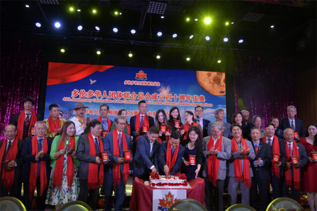 A group of people standing on a stage AI-generated content may be incorrect.