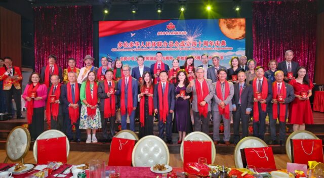 A group of people standing together AI-generated content may be incorrect.