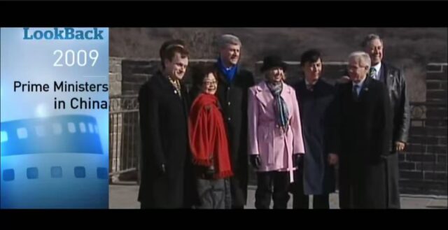 A group of people standing together AI-generated content may be incorrect.