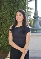 A person in a black dress AI-generated content may be incorrect.