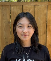 A person smiling at camera AI-generated content may be incorrect.