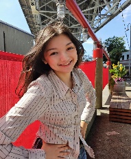 A person taking a selfie AI-generated content may be incorrect.