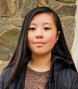 A person with long hair AI-generated content may be incorrect.